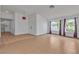 Spacious living room featuring tile flooring, ample windows, and neutral paint for personalization at 6405 Break Point Ave, Las Vegas, NV 89130
