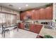 Functional kitchen with granite counters, a gas stove, and ample storage space for culinary enthusiasts at 6476 Little Harbor Ct, Las Vegas, NV 89141