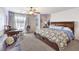 Bedroom featuring a ceiling fan, ample lighting, and furniture at 6484 Mount Eden Ave, Las Vegas, NV 89139