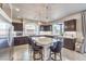 Spacious kitchen with a large island, stainless steel appliances and granite countertops, perfect for entertaining at 6484 Mount Eden Ave, Las Vegas, NV 89139