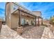 Spacious covered patio featuring comfortable seating, stone pillars, and ample natural light at 6484 Mount Eden Ave, Las Vegas, NV 89139