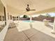 Beautiful back patio includes ceiling fan and outdoor kitchen area, great for entertaining at 6625 Gossamer Fog Ave, Las Vegas, NV 89139