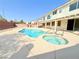 Backyard features a sparkling pool, relaxing hot tub, and private patio at 6625 Gossamer Fog Ave, Las Vegas, NV 89139