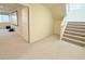 Spacious basement area with carpet and stairs at 6625 Gossamer Fog Ave, Las Vegas, NV 89139