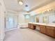 Primary bathroom featuring double sink vanity, soaking tub, and walk-in shower at 6625 Gossamer Fog Ave, Las Vegas, NV 89139