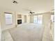 Bright living room with fireplace flows seamlessly to the kitchen at 6625 Gossamer Fog Ave, Las Vegas, NV 89139