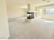 Large living room with a unique fireplace at 6625 Gossamer Fog Ave, Las Vegas, NV 89139