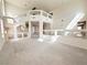 Bright and spacious living room featuring high ceilings and large windows at 6625 Gossamer Fog Ave, Las Vegas, NV 89139