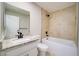 This bathroom features a shower-tub combination, granite counters, and modern fixtures at 6649 W Tropicana Ave # 101, Las Vegas, NV 89103