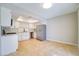 Well-lit kitchen with stainless steel appliances, white cabinetry, and stylish countertops at 6649 W Tropicana Ave # 101, Las Vegas, NV 89103