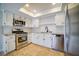 Kitchen featuring stainless steel appliances, granite counters, and white cabinets at 6649 W Tropicana Ave # 101, Las Vegas, NV 89103