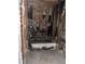 Fire damaged bathroom with exposed walls and a stained tub needs remodeling at 709 G St, Las Vegas, NV 89106