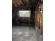 Bedroom shows fire damage with exposed wall studs and a window with security bars at 709 G St, Las Vegas, NV 89106