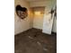 Bedroom with graffiti, a closet, and stained walls needing renovation at 709 G St, Las Vegas, NV 89106