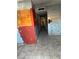 Damaged living room with peeling paint, graffiti, and missing fixtures needs repair at 709 G St, Las Vegas, NV 89106
