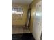 Damaged room with peeling paint and debris shows significant wear and tear at 709 G St, Las Vegas, NV 89106