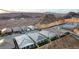Neighborhood featuring covered patios and well-manicured artificial lawns at 76 Tatahatso Point St, Henderson, NV 89011