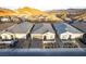 Beautiful new construction home with brick driveway and mountain views at 76 Tatahatso Point St, Henderson, NV 89011