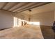 Large two car garage with overhead storage and high ceilings providing plenty of room for vehicles at 76 Tatahatso Point St, Henderson, NV 89011