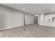 Bright living space featuring tile flooring and an open layout for entertaining at 76 Tatahatso Point St, Henderson, NV 89011