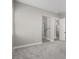 A neutral main bedroom has plush carpeting, natural light and an open ensuite bathroom area at 76 Tatahatso Point St, Henderson, NV 89011