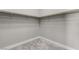 This walk-in closet shows built in shelving and ample space for organized storage of clothing at 76 Tatahatso Point St, Henderson, NV 89011
