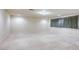 The spacious, carpeted basement offers great potential, with recessed lighting and a large window at 7641 Jacaranda Bay St, Las Vegas, NV 89139