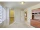 Bedroom features an open closet space, lots of light from the shuttered window, and built-in desk at 7641 Jacaranda Bay St, Las Vegas, NV 89139