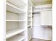 Spacious walk-in closet offering custom shelving for organizing clothes and accessories at 7641 Jacaranda Bay St, Las Vegas, NV 89139
