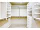 Custom walk-in closet features built-in shelving and ample storage space at 7641 Jacaranda Bay St, Las Vegas, NV 89139
