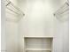 Walk-in closet space features white walls, carpeting, and white wire rack shelving at 7641 Jacaranda Bay St, Las Vegas, NV 89139