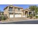 Beautiful two-story home featuring manicured landscaping, a three-car garage, and a lovely terracotta roof at 7641 Jacaranda Bay St, Las Vegas, NV 89139