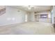 Spacious living room with fireplace and wet bar offers ample space and great flow for hosting at 7641 Jacaranda Bay St, Las Vegas, NV 89139
