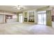 Open living room features a fireplace and a wet bar, perfect for entertaining guests at 7641 Jacaranda Bay St, Las Vegas, NV 89139