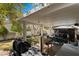 Well-appointed backyard with covered patio, barbecue, serving area, and a secondary gazebo at 8125 Boxberry Ave, Las Vegas, NV 89131