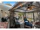Inviting outdoor gazebo featuring comfortable seating, a ceiling fan, and string lights at 8125 Boxberry Ave, Las Vegas, NV 89131
