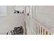 Bright upstairs hallway featuring white trim and an overlooking view of the lower level at 8125 Boxberry Ave, Las Vegas, NV 89131