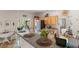 Updated kitchen boasts granite countertops, stainless steel appliances, and backyard view at 8125 Boxberry Ave, Las Vegas, NV 89131