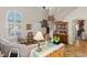 Spacious living room featuring vaulted ceilings, a staircase, and abundant natural light at 8125 Boxberry Ave, Las Vegas, NV 89131