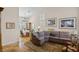 Inviting living room with high ceilings, travertine floors, and elegant decor at 8125 Boxberry Ave, Las Vegas, NV 89131
