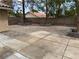 Spacious backyard features a patio with interlocking pavers and mature trees at 8154 Flanders Terrace Dr, Las Vegas, NV 89123