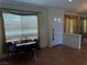 Inviting entryway with tile floors, draped windows, and front door at 8154 Flanders Terrace Dr, Las Vegas, NV 89123