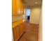 Hallway features tile floor, neutral walls and convenient built in storage at 8154 Flanders Terrace Dr, Las Vegas, NV 89123