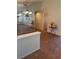 Neutral living area features tile floors, chandelier, and large wall mirror at 8154 Flanders Terrace Dr, Las Vegas, NV 89123