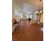 Open-concept living area with tile floors, dining table, and bright windows at 8154 Flanders Terrace Dr, Las Vegas, NV 89123