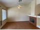 Bright living room with tile floors, fireplace, and a large window at 8154 Flanders Terrace Dr, Las Vegas, NV 89123