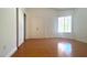 Bedroom featuring hardwood floors and a double door closet at 8216 Gillette St, Las Vegas, NV 89117
