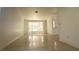 Open living room with a bay window and a neutral color palette at 8216 Gillette St, Las Vegas, NV 89117