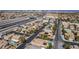 Aerial view of a neighborhood with a view of the city and mountains at 8266 Lincoln Valley St, Las Vegas, NV 89123