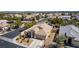 This is an aerial view of this desert home with manicured landscaping and a two car garage at 8266 Lincoln Valley St, Las Vegas, NV 89123